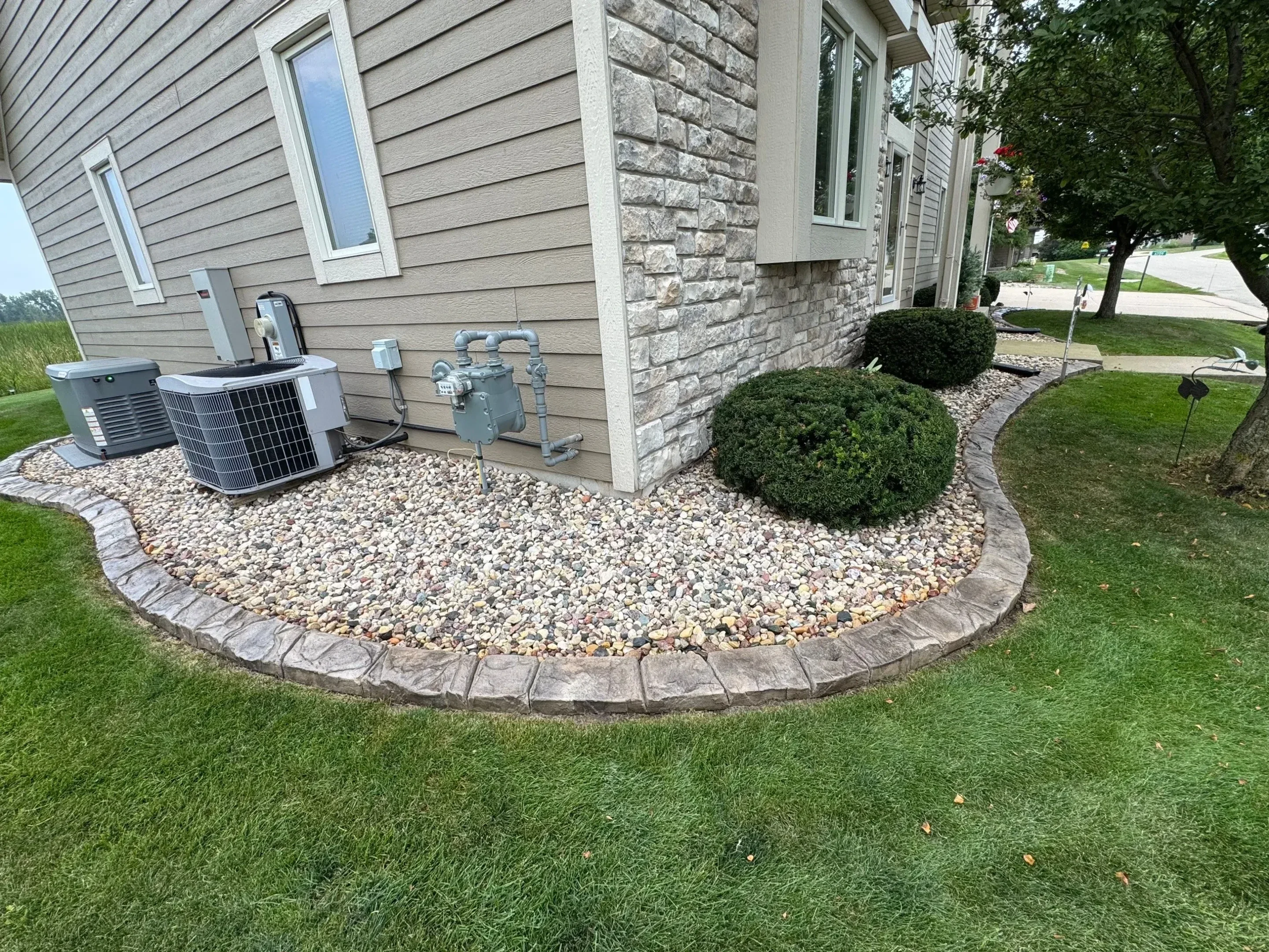 Landscape curbing along a garden bed in a Indiana yard